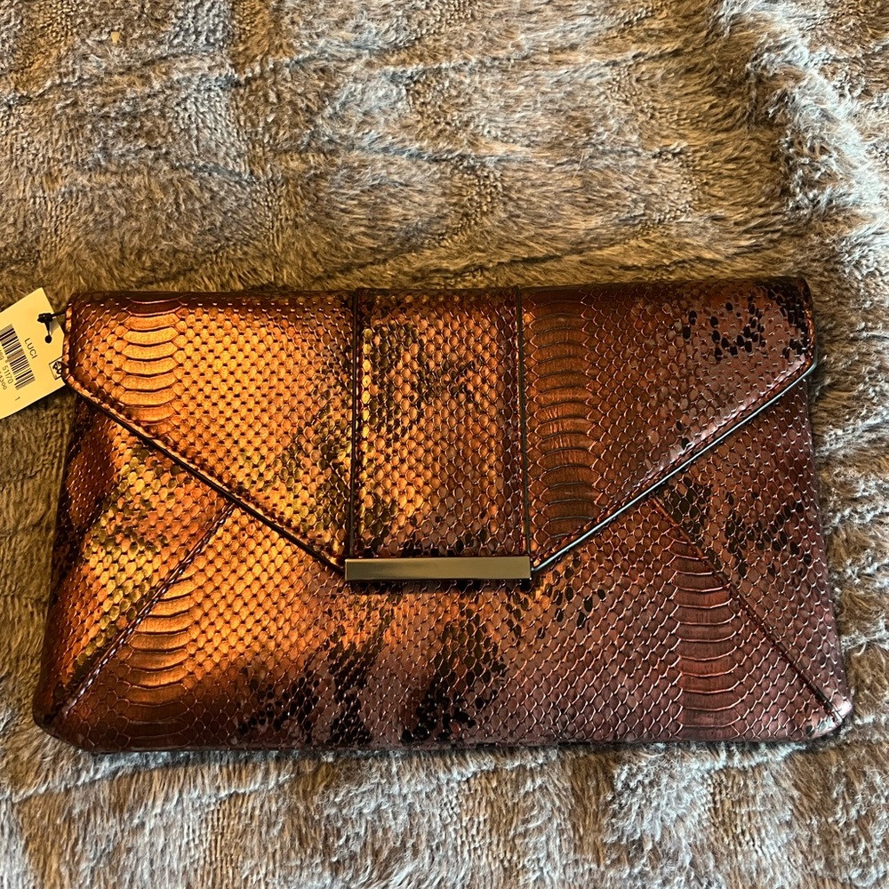 Elegant Pinky/Purplish Metallic Colored Snakeskin Clutch